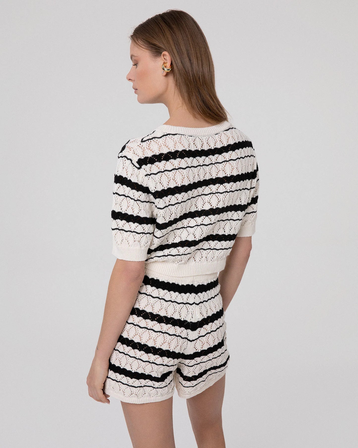 Crop top m/m in maglia traforata rigata Hinnominate